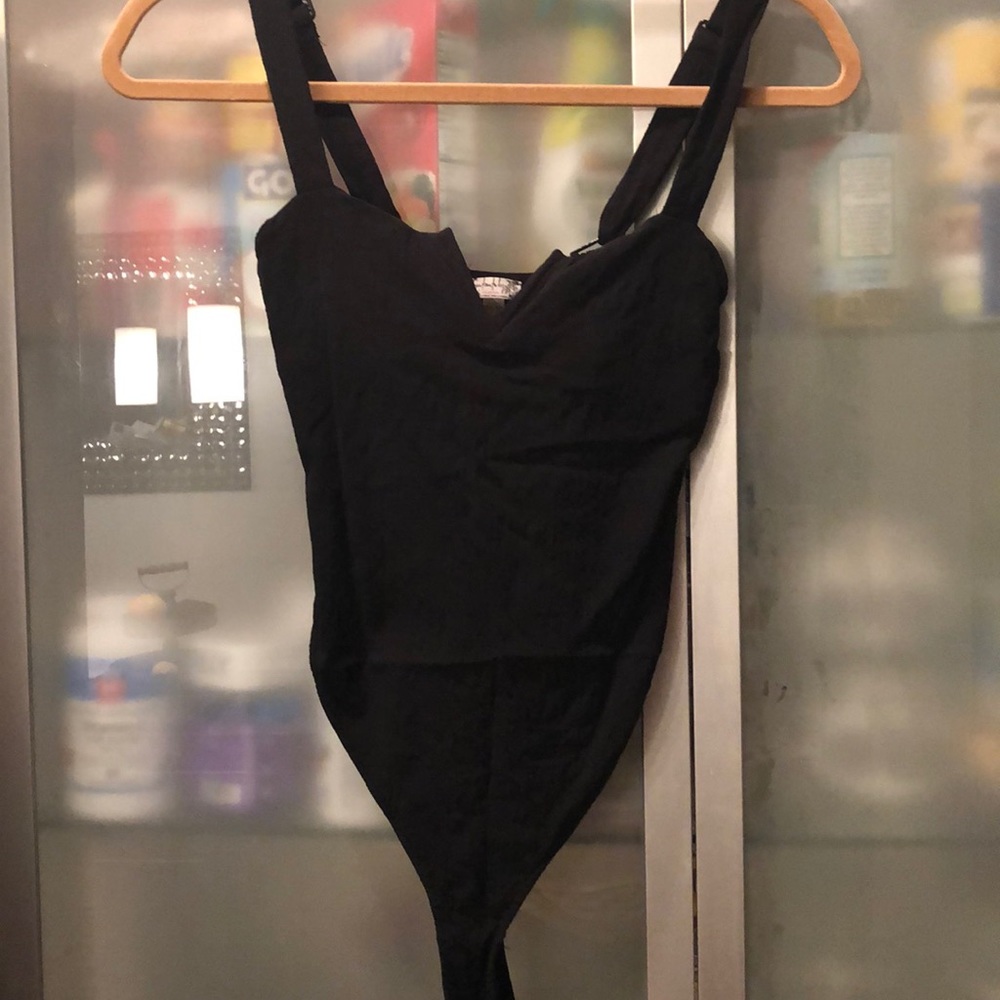 Black crepe like snap bodysuit
